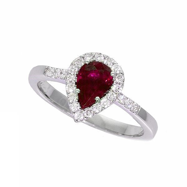 Precious ruby surrounded by twenty-three sparkling diamonds